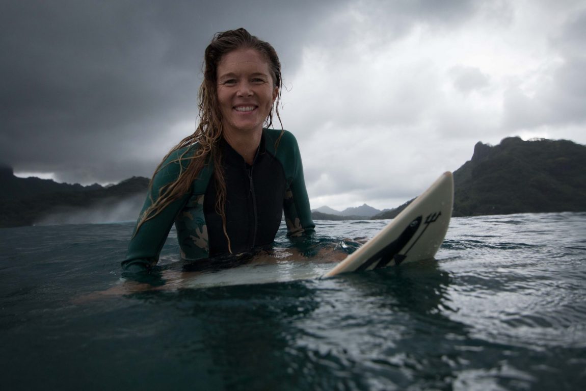 Liz Clark on surfboard