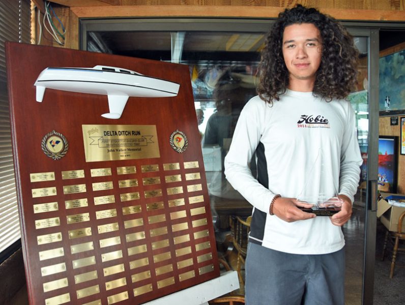 Marcos McGee with trophy