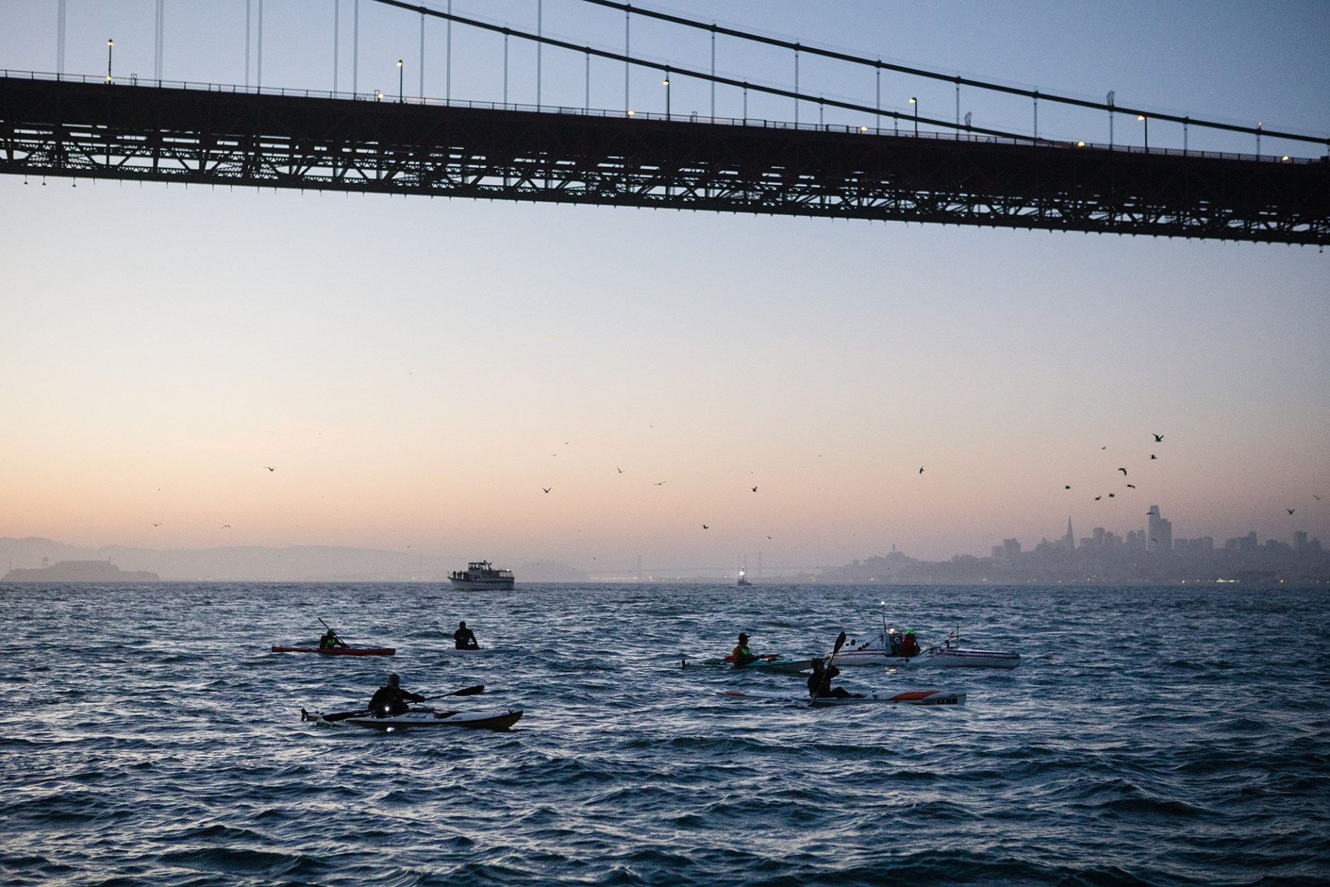 solo kayaker departs