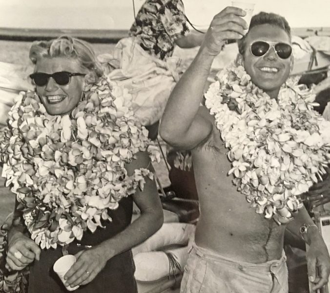 Jocelyn and Gordon Nash draped with leis