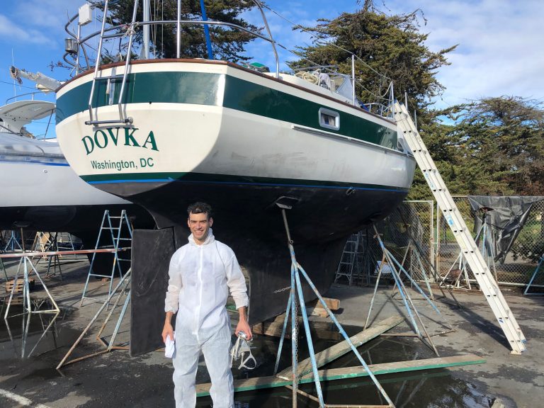 Ben Shaw w/ Dovka in boatyard