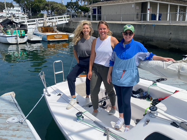 three women on sailboat