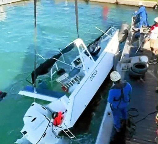 Capsized boat at dock