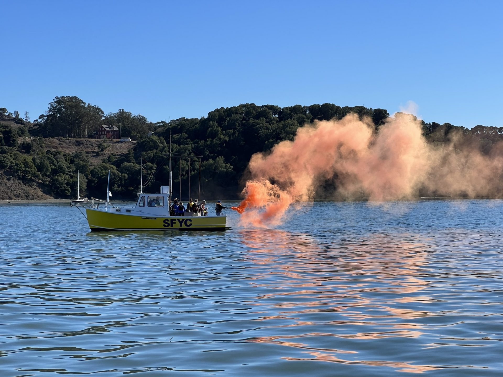 Marine flares off boat in Raccoon Strait