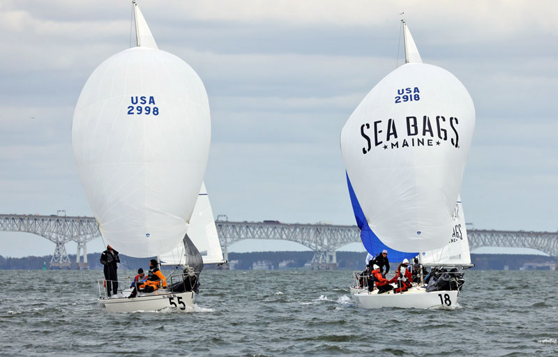 Two J/24s with white spinnakers