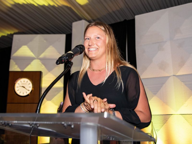 Daniela Moroz at US Sailing Leadership Forum podium