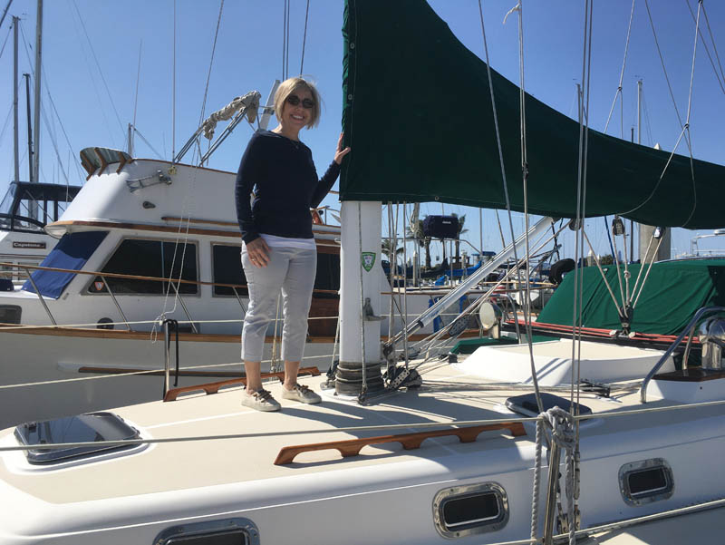Michelle Stevens aboard her Tartan 37, Savvy,