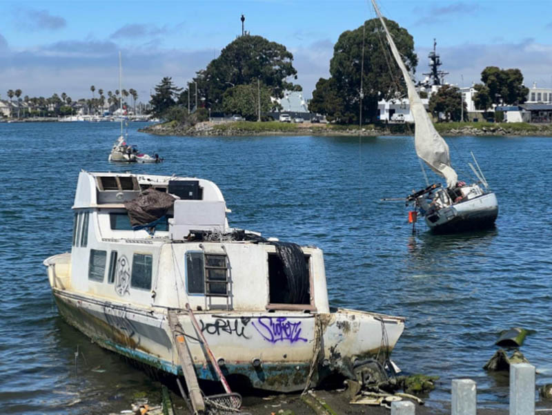 Tragic shoreline derelict boats.