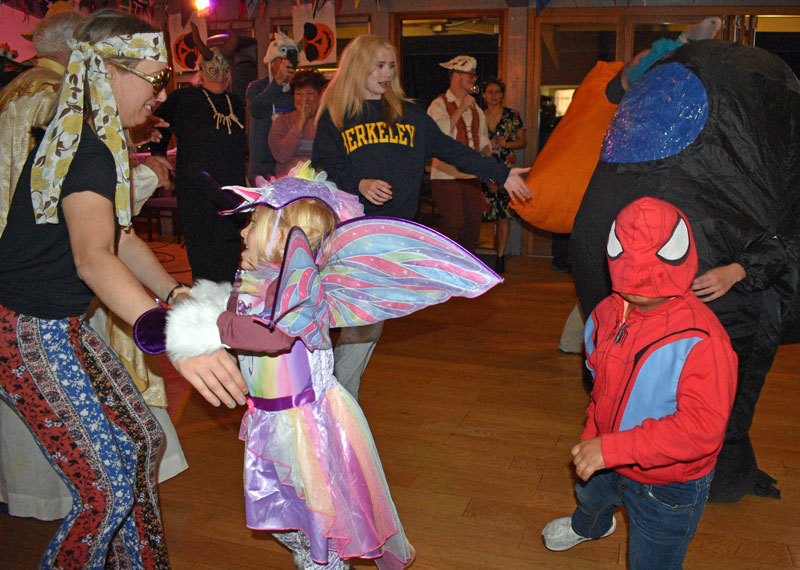 Kids in costume dancing