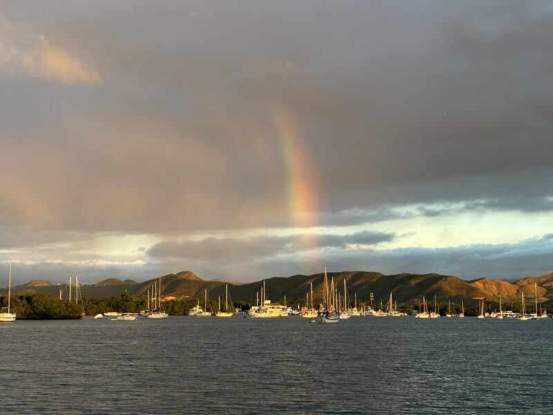 Rainbow over moored boats