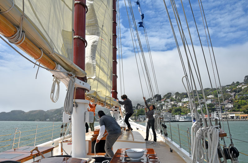 Hoisting sails on Freda B