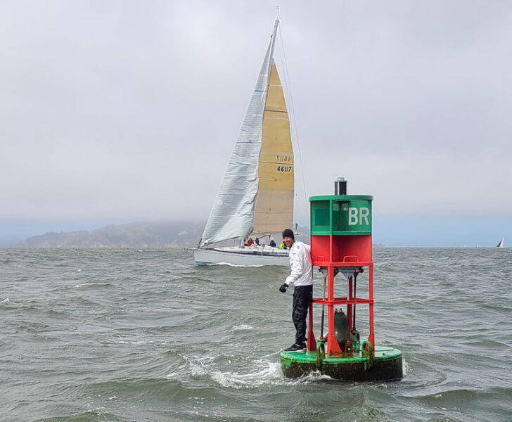 Man on Blossom Rock buoy