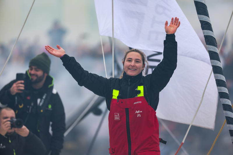 Violette Dorange waves to her many fans ashore.