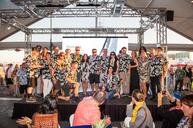 The crew of The crew of Barry Clark’s Grand Soleil 44 Blackwing attending the Trans Pacific Yacht Club celebration of the start of the 2025 Transpac Yacht Race with a Aloha Party on the USS Iowa in San Pedro, California on June 28, 2025.
