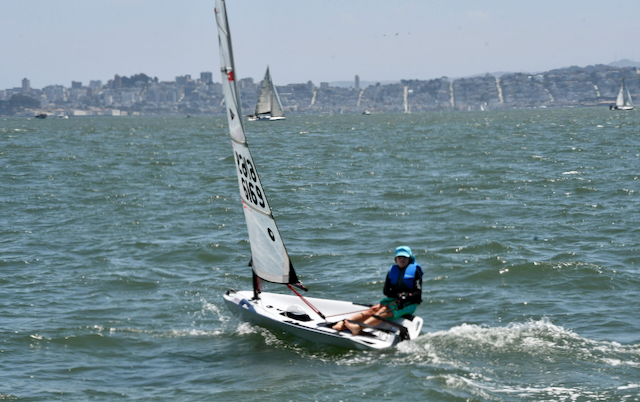 This sailor was solo sailing on his O'pen Bic was out zipping around Raccoon Strait. 
