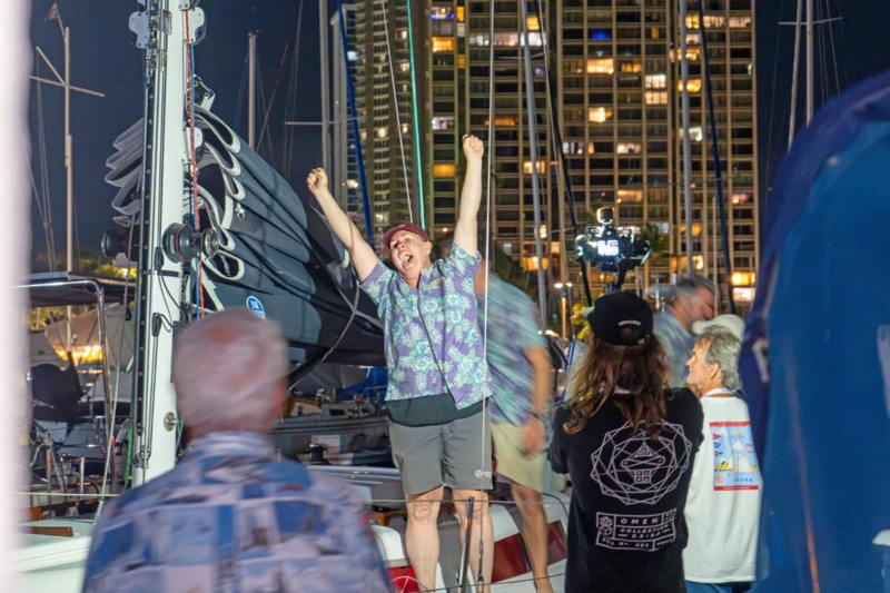 Alli Bell rejoices upon arrival in the Ala Wai marina.