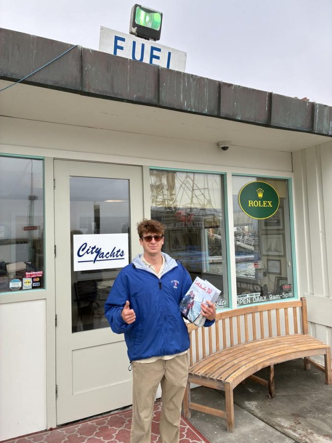 Assistant dockmaster, Rex. was ready to hand out the July issue of Latitude at Gashouse Cove/Cityachts.