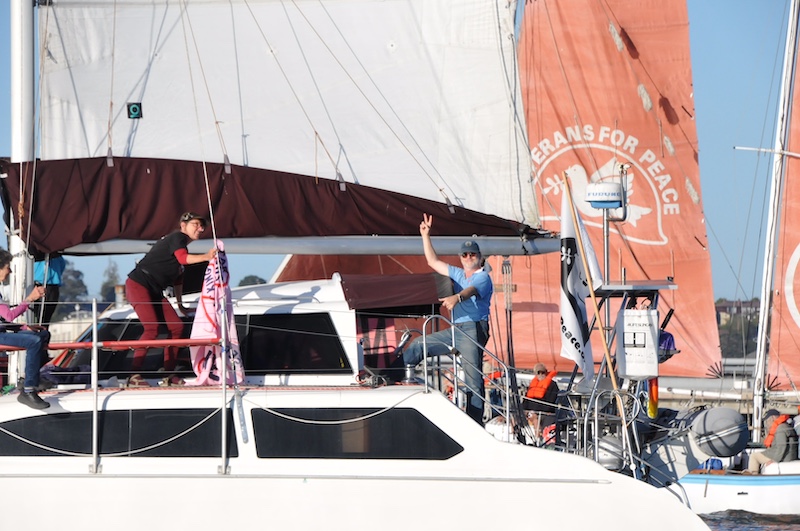 Peace boat Golden Rule crew waving