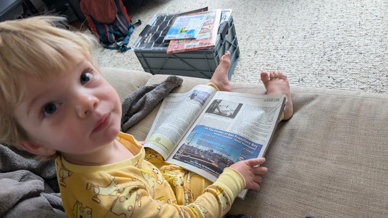 We can see Louis' toes are going to be hooked under a hiking strap soon.