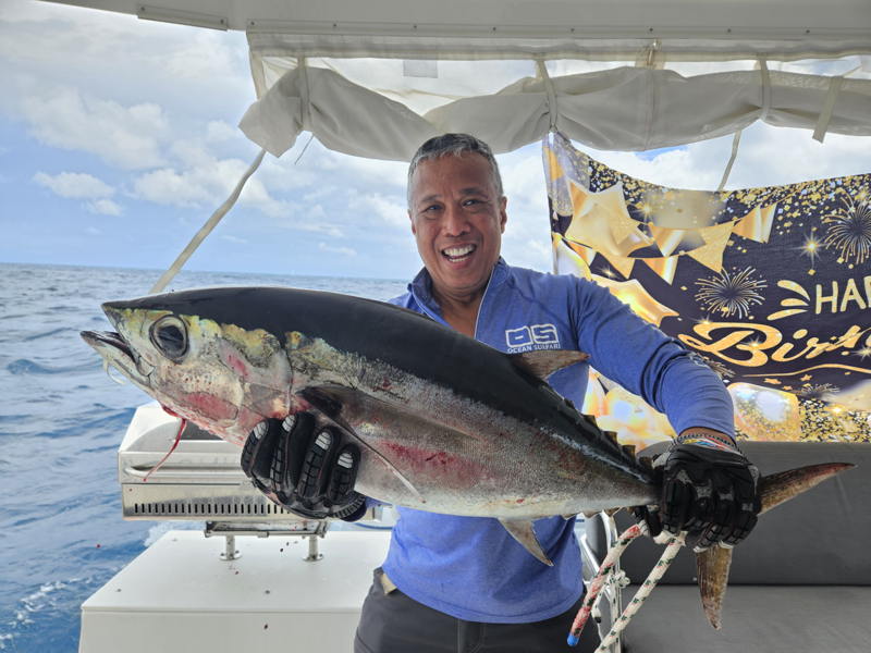Big fish, big eye, big meal. Fishing aboard Rising Dawn. 