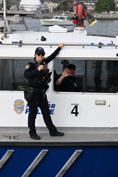 The San Diego Harbor Police swung by the committee boat to say hello and check on the starting sequence. 