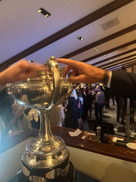 Cayard points to his named engraved on the Star trophy in 1998.