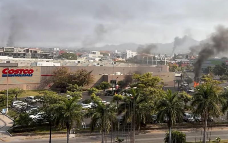 The Puerto Vallarta Costco is in good shape though intruded upon with vehicle fires.