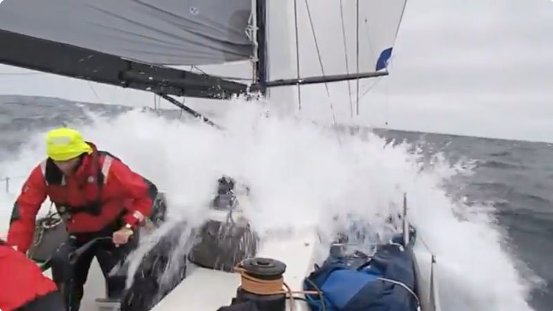 Wave crashing over bow