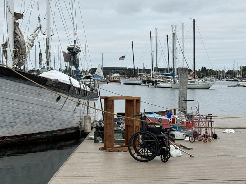 This dock is there kids, boats, lifejackets and instructors are meant to meet for rowing camp.