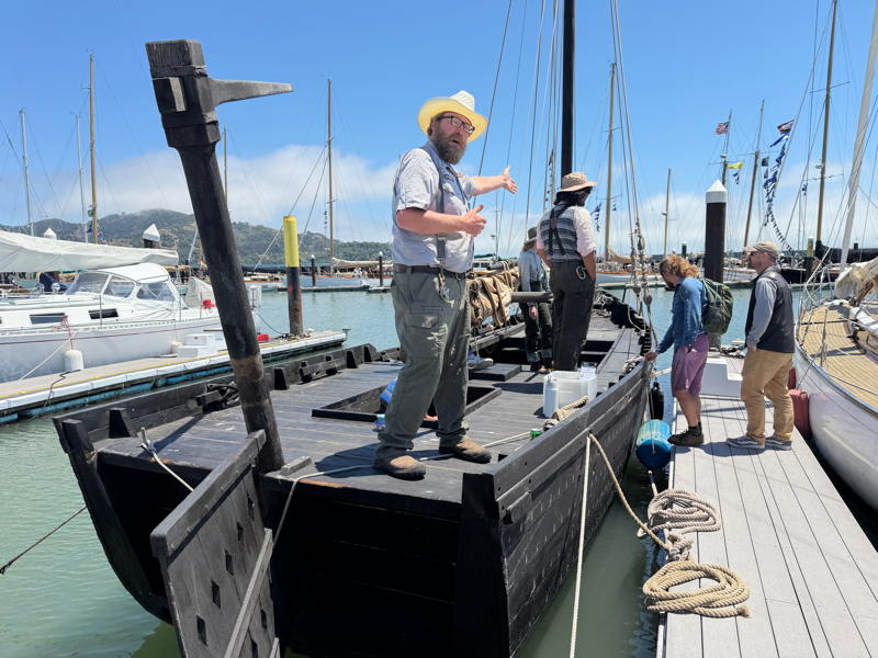 San Francisco Maritime Museum ranger explains the Grace Quan to visitors.