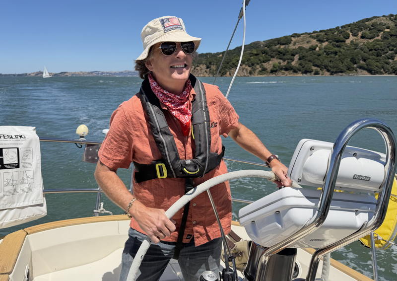 Jim Baldwin started the summer smiling throughout the shirt-sleeve sailing on the Bay.