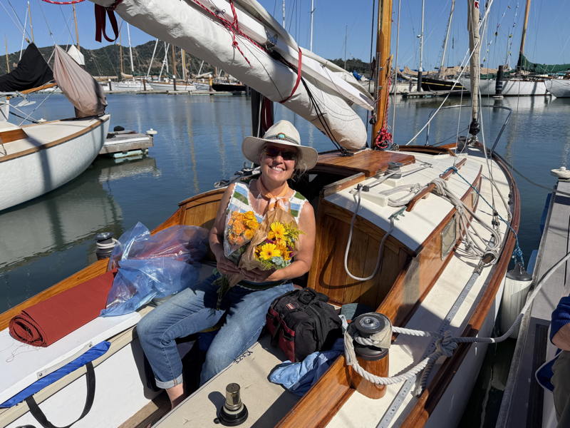 Liz Diaz, Master Marines Staff Commodore, putting the finishing touches on her 26' Master Mariners boat, Kazi, ahead of the boat show.