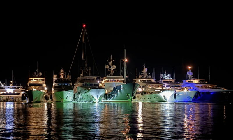 Megayachts docked in formerly quaint Nantucket harbor.
