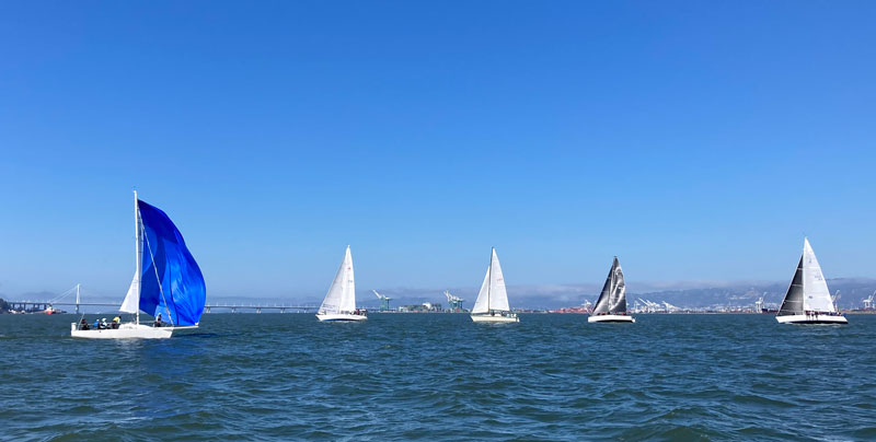 Boats racing south of the Bay Bridge