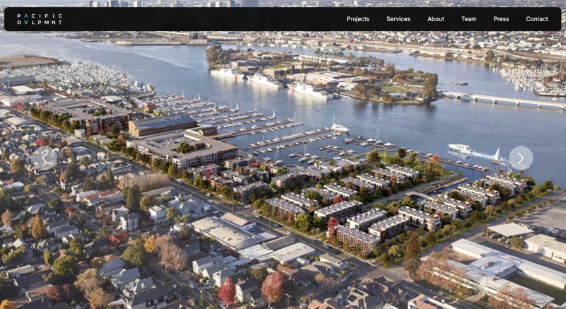 The large building in the middle of all the new housing built on the former home of a diverse ecosystem of marine businesses.