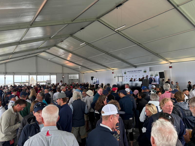 A huge gathering of exhausted racers celebrated another in the big tent at the trophy ceremony for the Rolex Big Boat