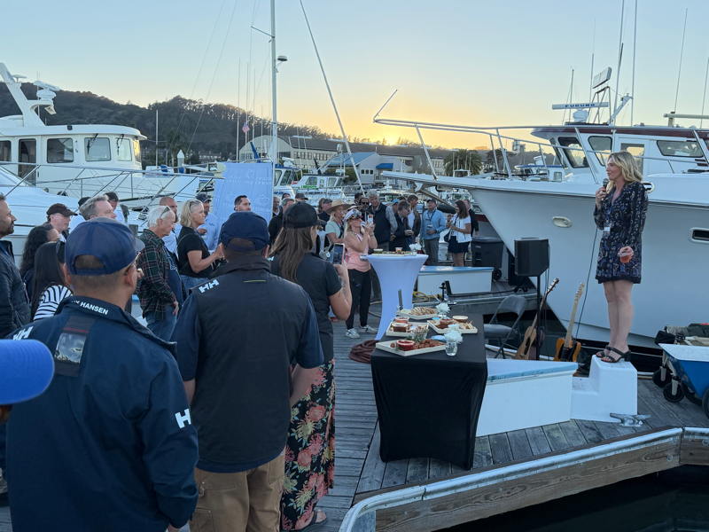 Nadine Urciuoli of Helmut's Marine hosted a fund raising party on the docks to get kids from Marin Foster Care onto the Bay.