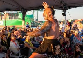 Maui/ Tongan dancer Afa, performing a traditional New Zealand haka for the crowd.