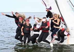 The Stanford sailing team celebrates winning their third straight Women's Team Racing national champoinship.