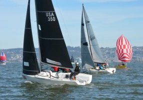 Melges 24, Olson 30 and SC 27 racing, with other boats in the background.