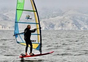 Dave foil windsurfing in the Ronstan Bridge to Bridge.