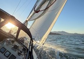 Should we look at the instruments? The beautiful sun through the dodger? The shape of the jib? Or the starboard tacker shouting at us?