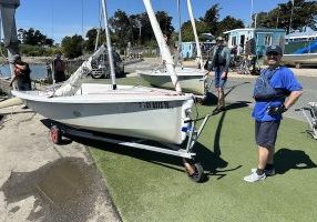 Instructor Marco Falcioni prepares to splash a dinghy.