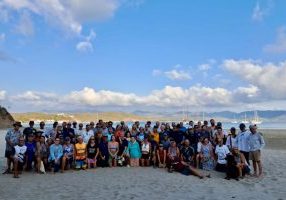 The post Tenacatitia Romp gathering on the sandy Mexican beach.