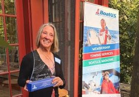 Karen Prioleau accepts the 2026 BoatUS/NWSA Leadership in Women's Sailing Award.
