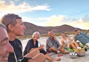 left: Sundowners
at sundown with friends from 'Boussole' and 'Pearl';