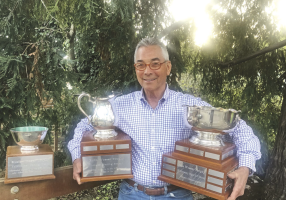 Ron Young with the Wosser Trophies.