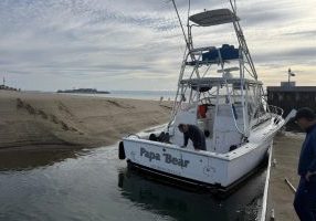 A powerboat tried to leave the incredibly narrow harbor entrance on April 19. While it has been a problem for months, in the past three weeks the entrance has become nearly non-navigable. 