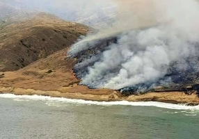 Gale-force winds helped a wildfire spread quickly across Santa Rosa Island, destroying two historic