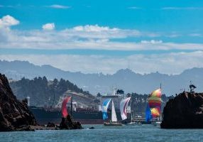 Boats navigate rocks and tankers in the 2026 Jazz Cup. 